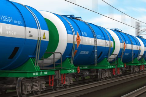 Freight train with petroleum tanker cars
